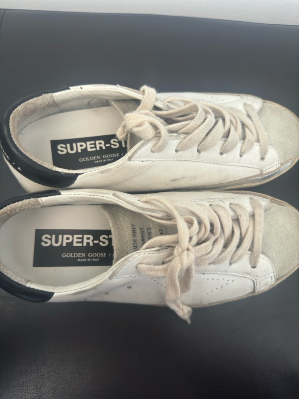 Golden Goose white leather low-top sneakers with black heel tab